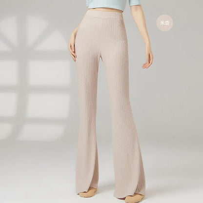 Female classical dance practice training pants in polyester, shown in beige apricot colour.