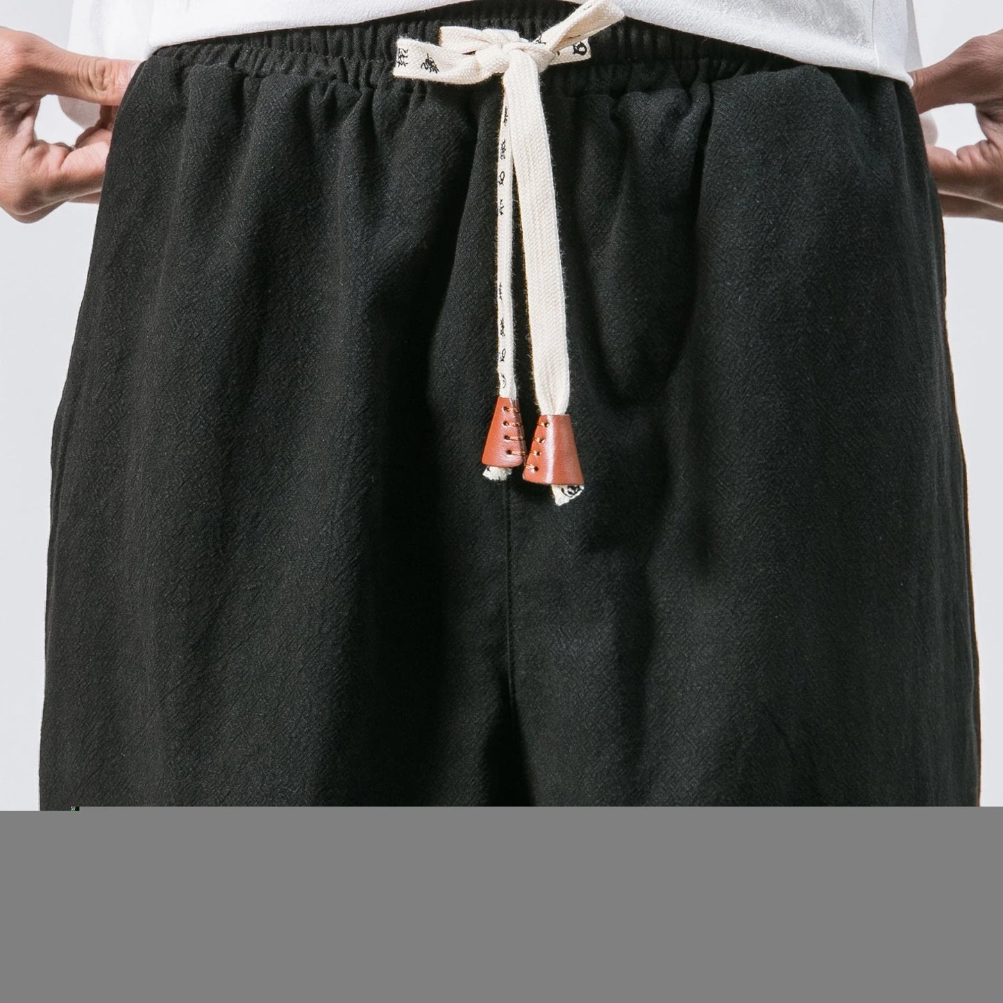 Premium cotton men's jogger pants with adjustable waistband, convenient pockets, and tapered leg design for everyday comfort and style