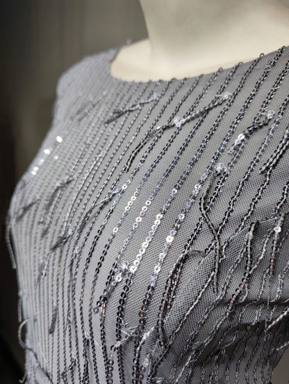 Sequin Tassels Slim-fit Muslim Dress in gold and silver with unique detailing