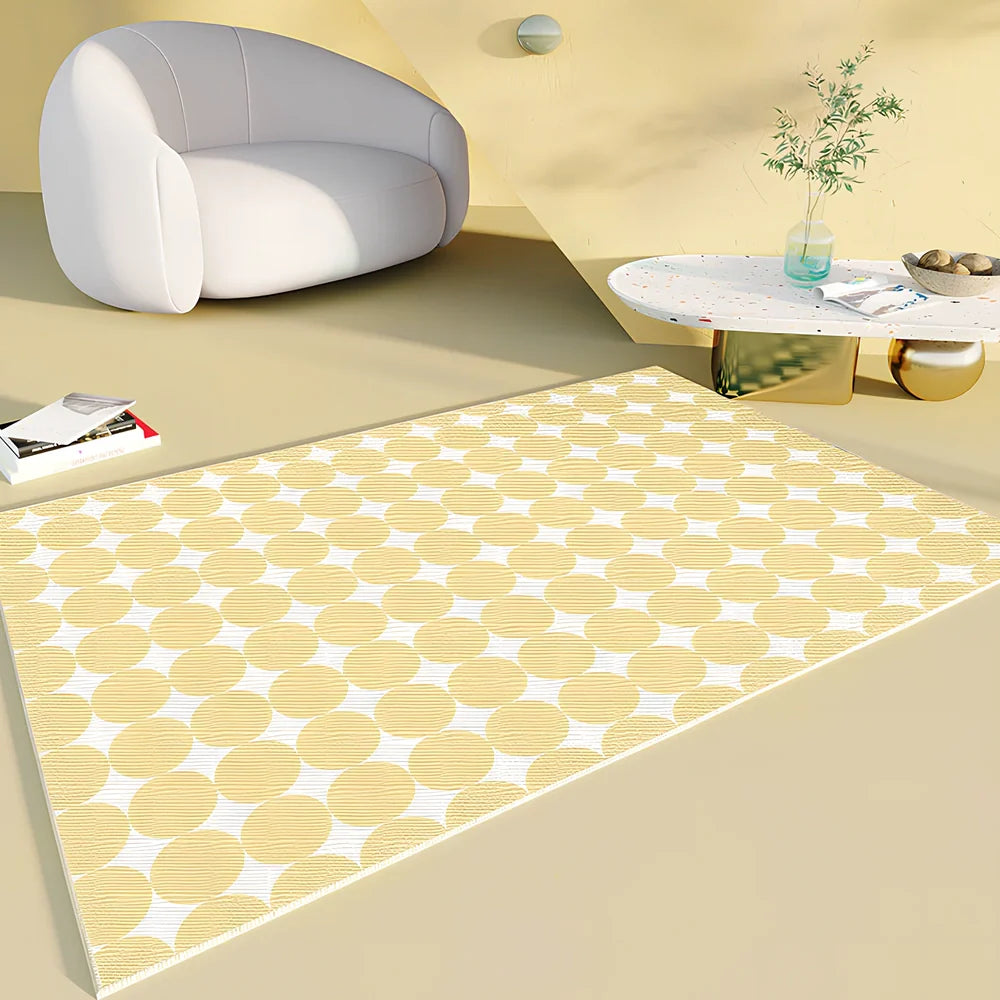 Rectangular checkboard pattern rug in dark green with geometric squares on living room floor