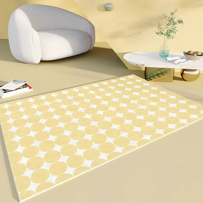 Rectangular checkboard pattern rug in dark green with geometric squares on living room floor