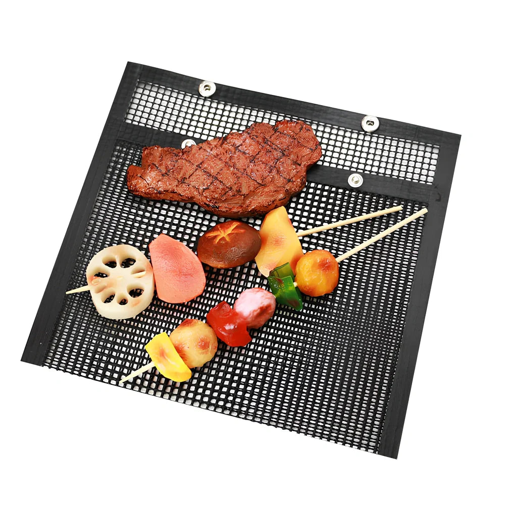 Black grill mesh bag with non-stick grid mat on barbecue, showing smoke circulation through mesh design
