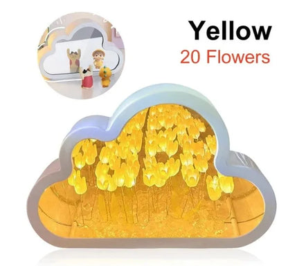 DIY tulip-shaped night lamp kit with LED lights and mirror surface in assorted colours on a desk.