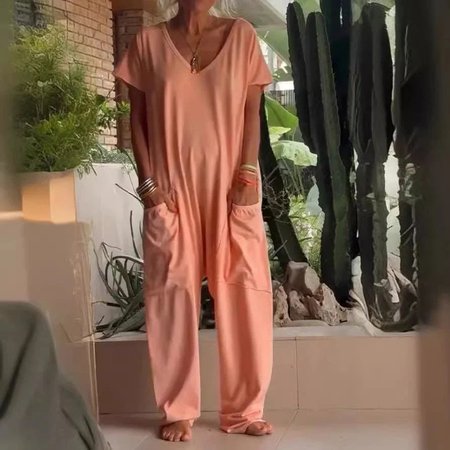 A stylish and comfortable oversized jumpsuit with roomy pockets, available in a variety of vibrant colors.
