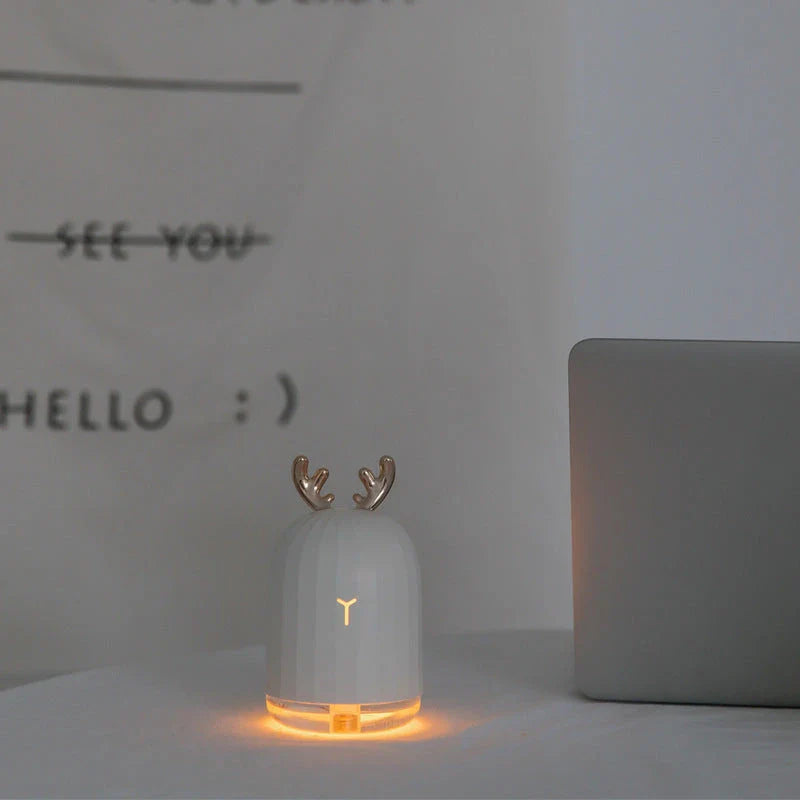 Compact deer-shaped humidifier with USB power for small spaces up to 100 square feet