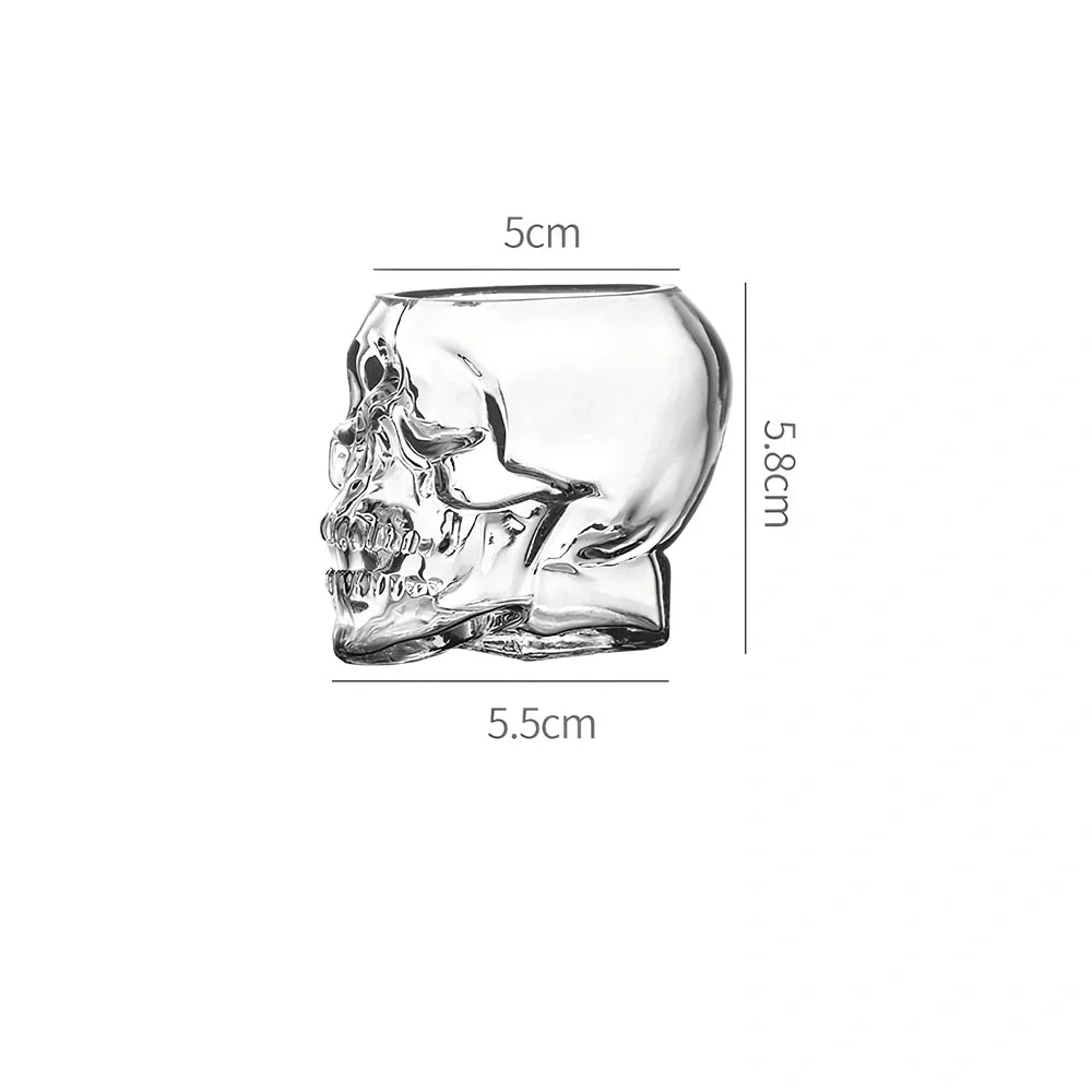 Transparent skull-shaped wine glass with detailed features and 160ml capacity measurement