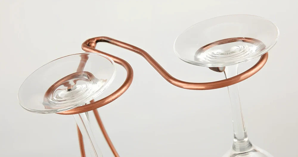 Stainless steel wine rack measuring 320mm wide with wine bottle storage