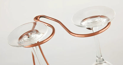 Stainless steel wine rack measuring 320mm wide with wine bottle storage