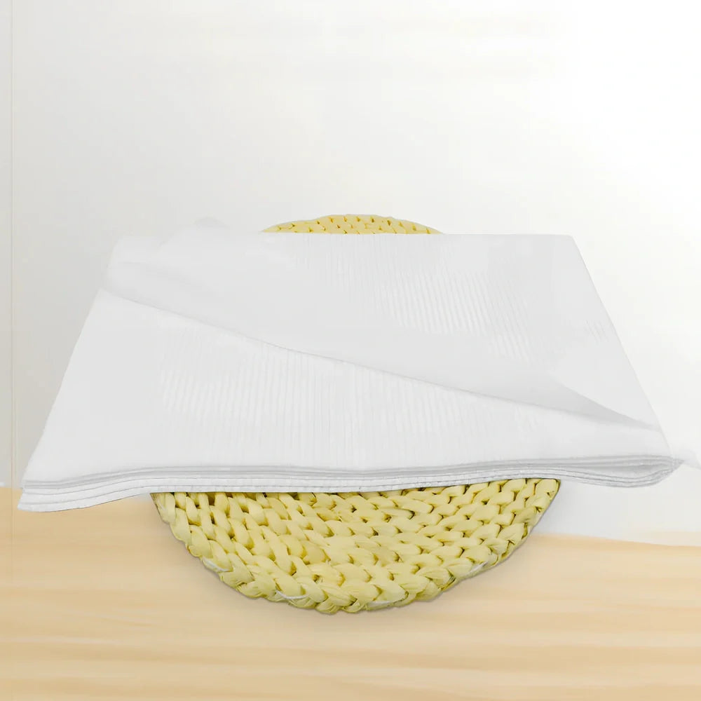 Pack of non-woven disposable bath towels 65x135cm with pearl pattern for absorbent drying