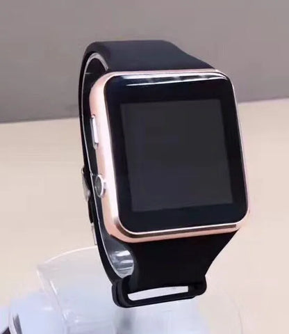 Smart watch with 1.54-inch touch screen display and silicone strap in black, gold, or white colours