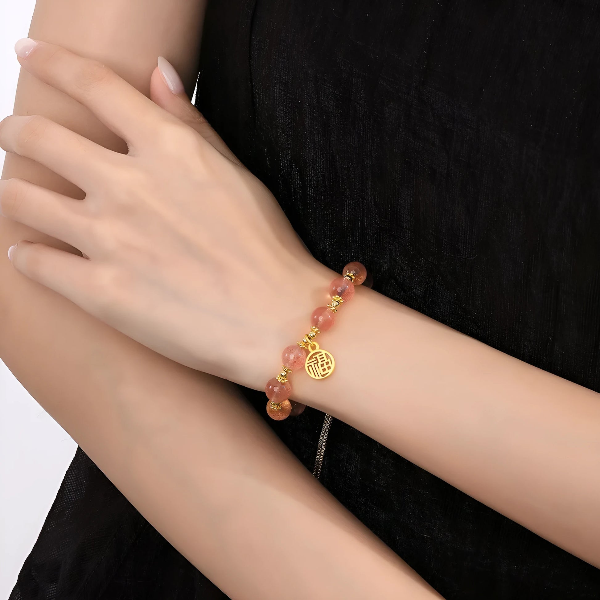 Strawberry quartz bracelet with gold electroplated metal and engraved fu character geometric jewellery design