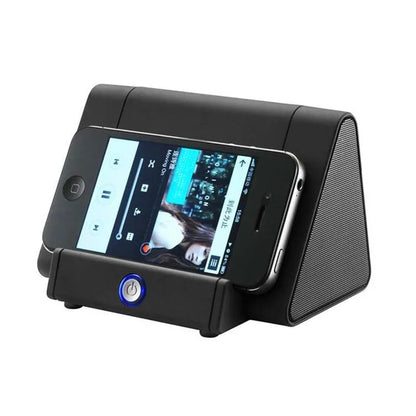 Small black wireless Bluetooth speaker for mobile phones and computers with charging cable