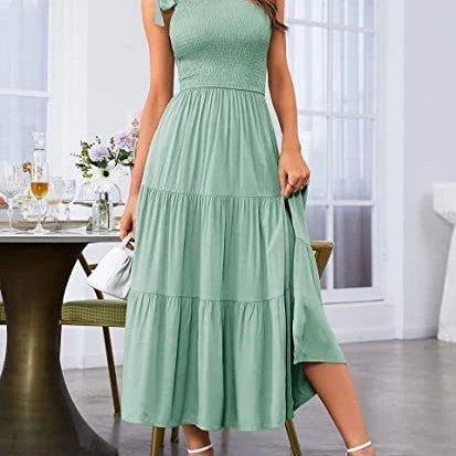 Stunning one-shoulder dress with pleated, asymmetrical hemline and side slits