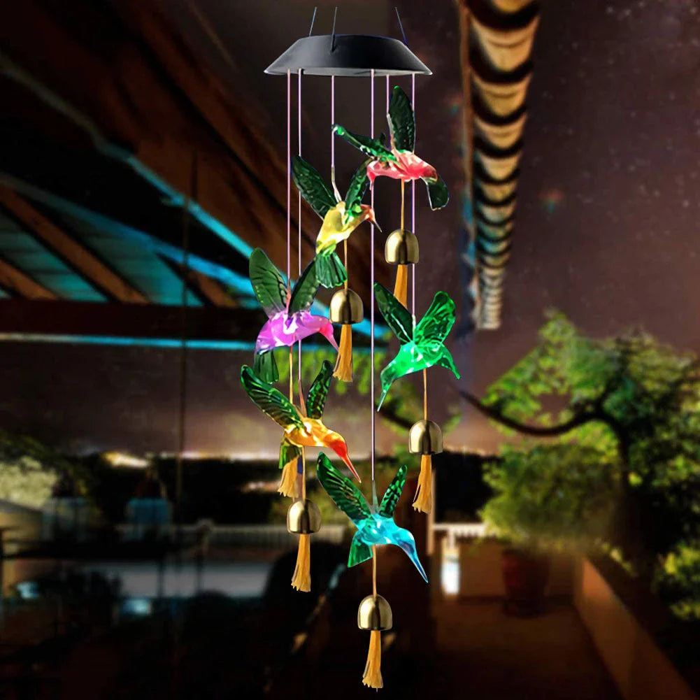 Vibrant solar-powered color changing wind chime with hummingbird and butterfly design for outdoor decor