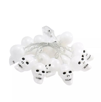 Battery-powered LED skeleton skull string lights for Halloween decor with durable plastic construction