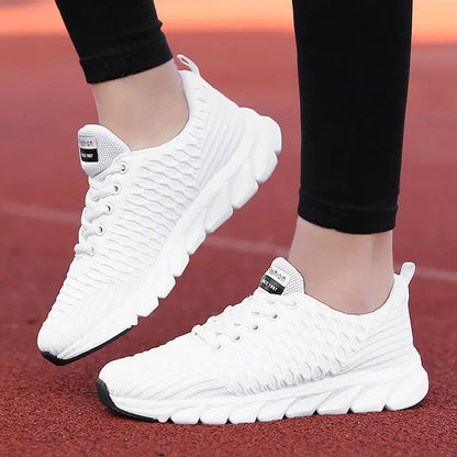Women's running shoes with fly weaving upper material and wear-resistant outsole in black, pink, white colours