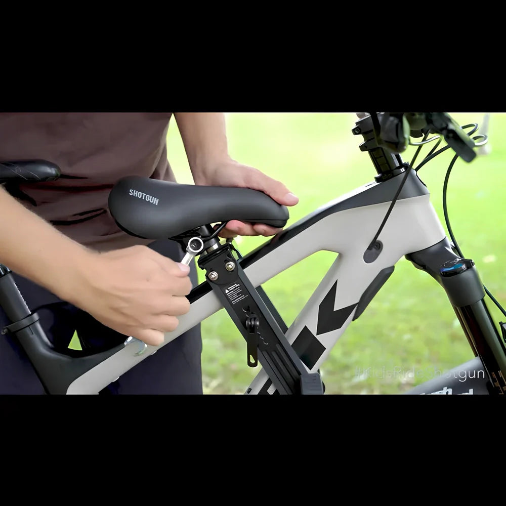 Black front-mounted kids bicycle seat with quick-release attachment for mountain bikes