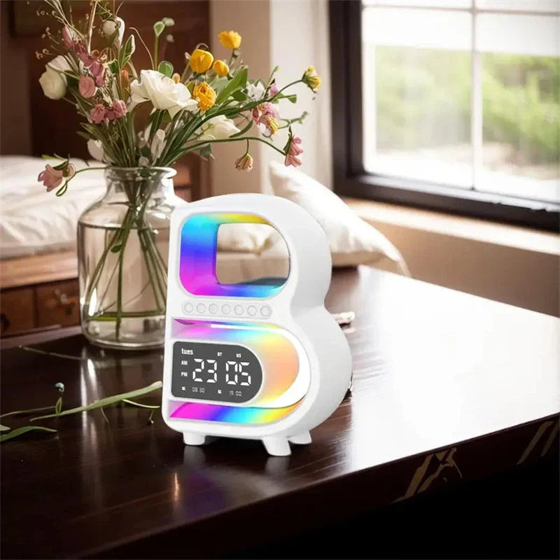 B-shaped Bluetooth speaker with wireless charging, adjustable lighting, and alarm clock functionality