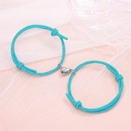 Fashionable magnetic couple bracelets with heart-shaped charms in various color options