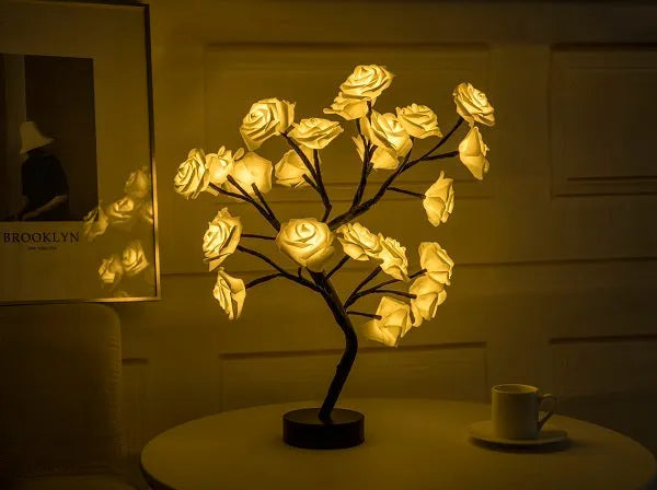 White and red rose flower LED lamp on a bonsai tree stand with warm white lights.