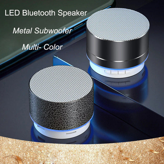 Portable Bluetooth speaker with colorful LED lights, offering impressive sound quality and convenient features for on-the-go music enjoyment.