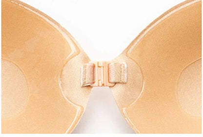 A discreet, backless and strapless silicone bra that provides a natural lift and invisible support under clothing.