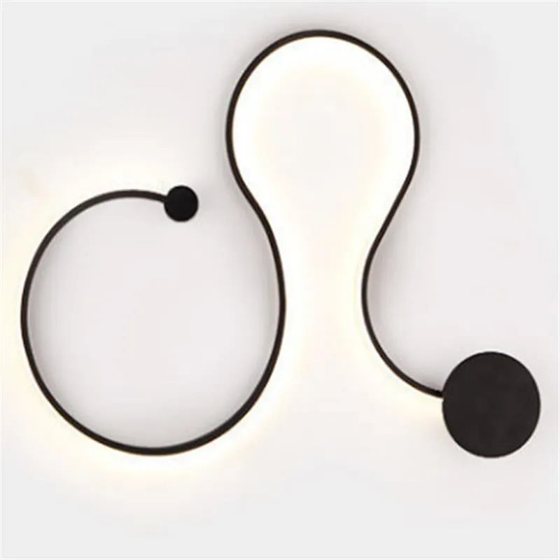 Modern black and white LED wall lamp with aluminium shade in four different sizes for bedside or corridor lighting