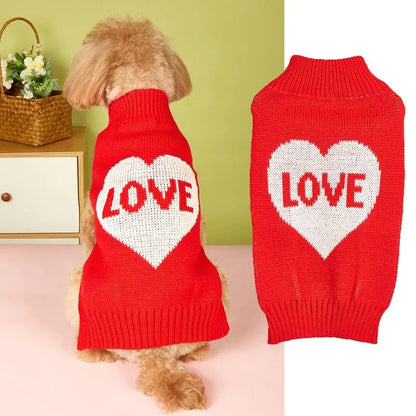 Red love heart pattern dog sweater with pink bow decoration on small dog