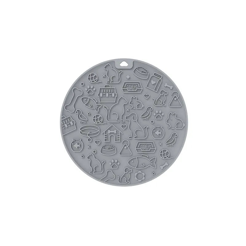 Round blue silicone pet licking mat with textured surface and suction base for slow feeding