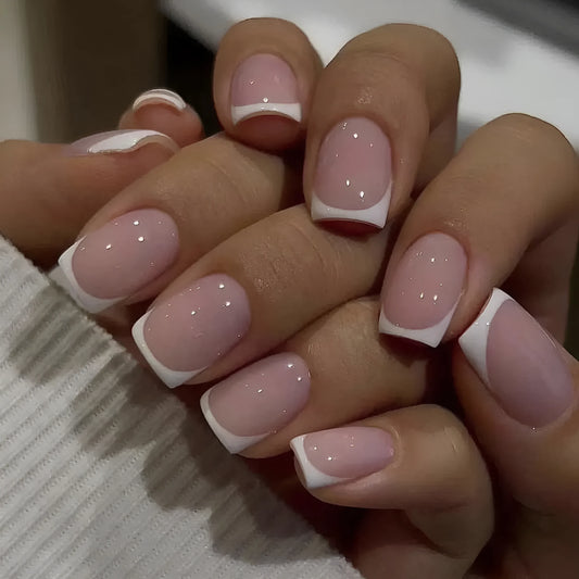 24 plaid-patterned false nail tips on white background showing check design