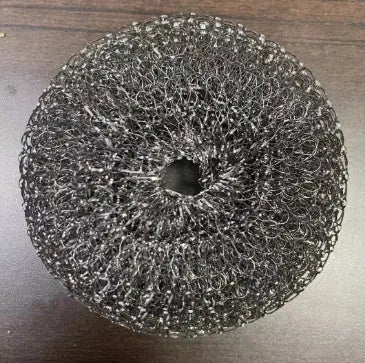 Black and gold kitchen palm brush with soap dispenser for scrubbing stoves and tiles