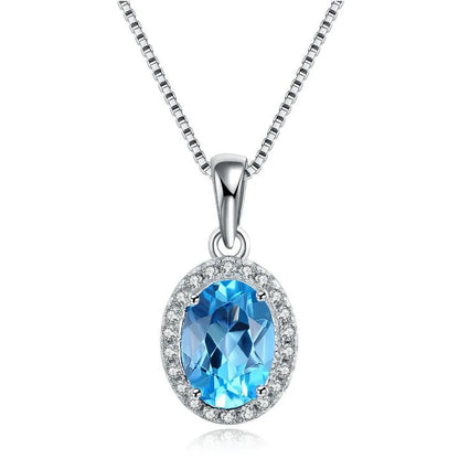925 sterling silver jewellery set with blue topaz gemstones in geometry pattern, including earrings, ring, pendant, and necklace