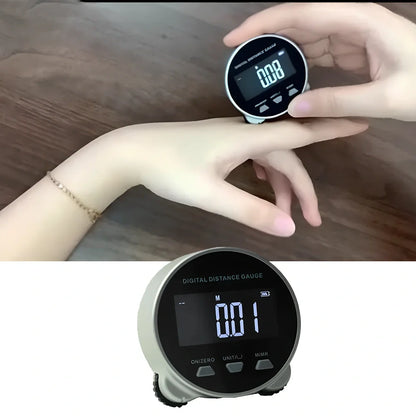 Grey digital rolling measurement tool displaying 200m range on straight surfaces with cm/inch units