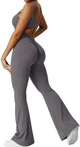 Women's sleeveless flare jumpsuit for yoga in high elasticity polyester fabric.