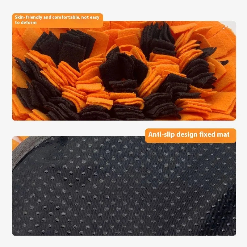Orange pumpkin-shaped fleece pet slow feeder mat for dogs and cats on a wooden floor