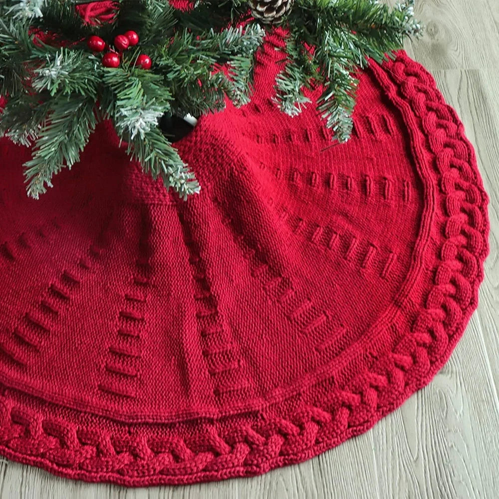 Red knitted Christmas tree skirt with 122cm diameter showing traditional wool construction