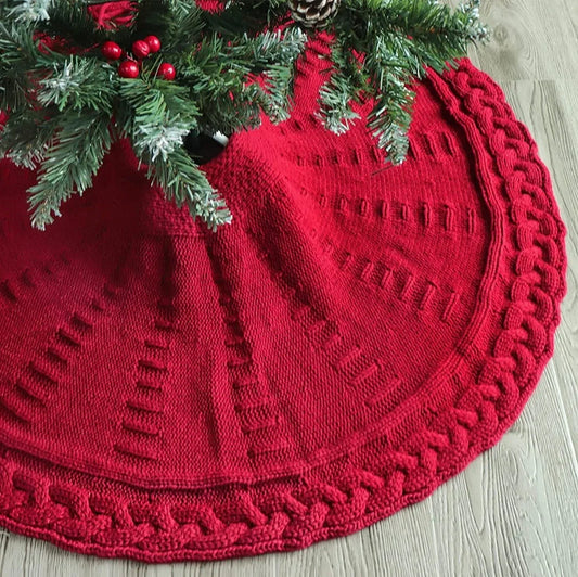 Red knitted Christmas tree skirt with 122cm diameter showing traditional wool construction