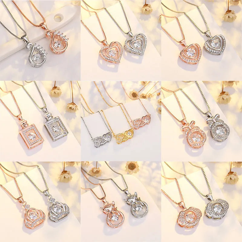 Sterling silver heart-shaped pendant necklace with a small crown and bow design, shown in a rose gold finish.