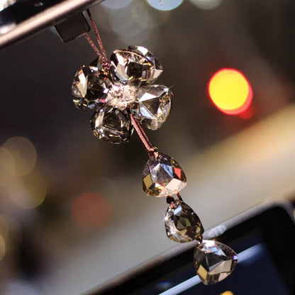Crystal four leaf grass car interior pendant in transparent, champagne, black, or shiny finish, approximately 20cm long.