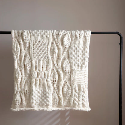 Beige hand-woven acrylic wool blanket 120x150cm 1.7kg on sofa, low 2-3% shrinkage