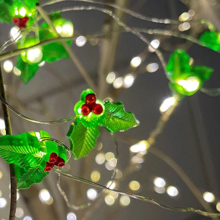 Customizable Christmas LED string lights in various designs including gift, bell, and Christmas tree shapes
