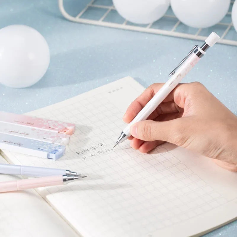 Simplified 0.5mm cartoon automatic pencil set with three pencils and refill boxes in mixed colours