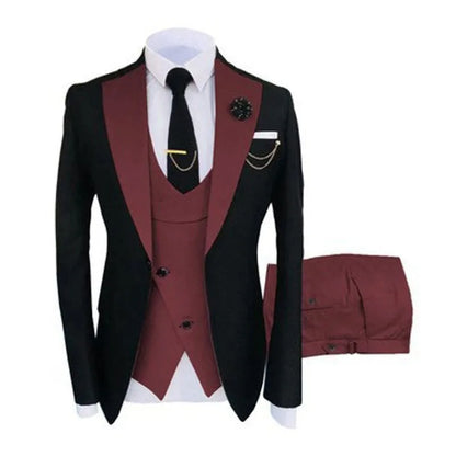 Men's slim fit three-piece business suit in black with contrasting vest, showing complete coat, vest, and trousers set