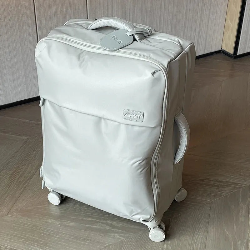 Ultra-light waterproof Oxford cloth suitcase in bluestone green with universal wheels and breathable lining