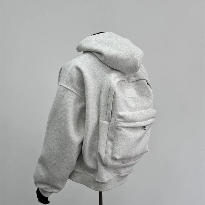 Light grey men's backpack design hooded coat jacket on a hanger.