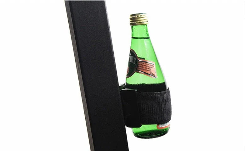 Magnetic sports water bottle with adjustable silicone grip that securely attaches to metal surfaces for hands-free hydration during workouts and outdoor activities