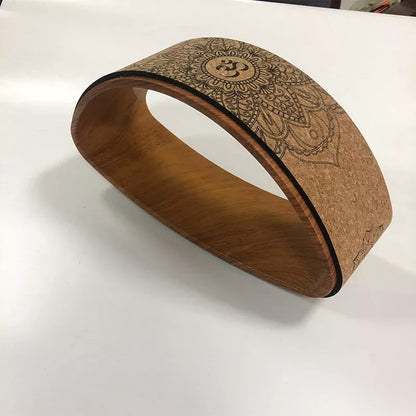 Cork Yoga Wheel Half-round for backbend and core exercises in black and wood grain