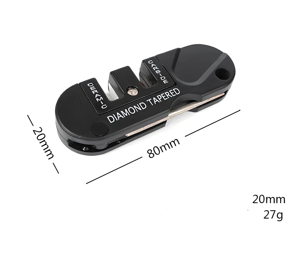 Black Pocket Pal knife sharpener showing carbide blades, ceramic stones, and tapered diamond rod on 3.5-inch compact unit