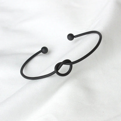 Elegant Knot O-Type Metal Openwork Bracelet with unique design for stylish women