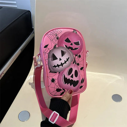 Halloween graffiti print crossbody bag in black with pumpkin, ghost, and bat designs, measuring 14x23x9.5cm